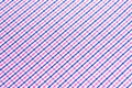 Blue and pink tartan or plaid background.