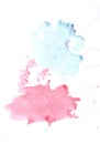 Blue and pink watercolor paint stains on white papper