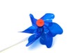 Blue pinwheel on white background Royalty Free Stock Photo