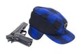 Blue plaid hunters Hat and gun Royalty Free Stock Photo