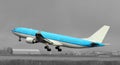 Blue plane taking off Royalty Free Stock Photo