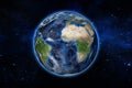 Blue planet earth from space showing America and Africa, USA, globe world with blue glow edge on space in a star field Royalty Free Stock Photo