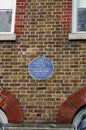 Blue plaque outside he home od Dante Gabriel Rossetti and Algemon Charls Swinburne, London, United