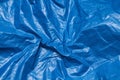 Blue plastic bag texture background. Waste recycling concept. Crumpled polyethylene and cellophane. Royalty Free Stock Photo