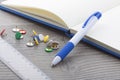 Blue plastic ball pen with office supplies Royalty Free Stock Photo