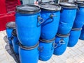 Blue plastic barrels logistic image