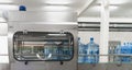 Blue plastic bottles on automated conveyor line or belt on pure water factory Royalty Free Stock Photo