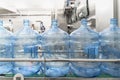 Blue plastic bottles on automated conveyor line or belt on pure water factory Royalty Free Stock Photo