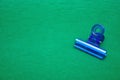 A blue plastic bulldog clip Royalty Free Stock Photo
