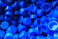 Blue plastic caps used to seal beverage bottles Royalty Free Stock Photo