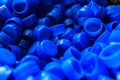 Blue plastic caps used to seal beverage bottles Royalty Free Stock Photo