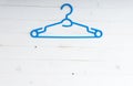 Blue plastic clothes hanger Royalty Free Stock Photo