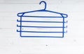 Blue plastic clothes hanger Royalty Free Stock Photo