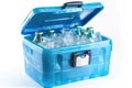 Blue plastic cool box with ice cubes and bottles of water on white background. Generative AI Royalty Free Stock Photo