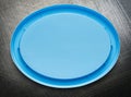 Blue plastic cover on steel background