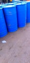 Blue plastic gallons full of various flammable waste at the recycling center Royalty Free Stock Photo