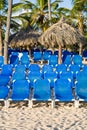 Blue plastic Lounges on white sand beach Royalty Free Stock Photo