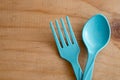 Blue plastic spoon and fork Royalty Free Stock Photo