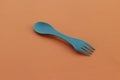 Blue plastic spork Royalty Free Stock Photo