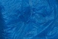 Blue plastic texture of crumpled piece of cellophane