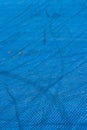 Blue plastic texture playground with trails on it. Royalty Free Stock Photo