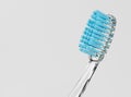 Blue plastic toothbrush isolated Royalty Free Stock Photo