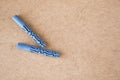 Blue plastic wall plugs on the brown background Royalty Free Stock Photo
