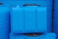 Blue plastic water and liquids barrel storage containers Royalty Free Stock Photo