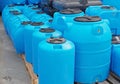 Blue plastic water and liquids barrel storage containers Royalty Free Stock Photo