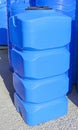 Blue plastic water and liquids barrel storage containers Royalty Free Stock Photo