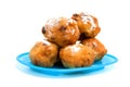 Blue plate with Dutch donut asa oliebollen Royalty Free Stock Photo