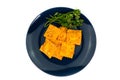 Blue plate with fish ravioli with parsley Royalty Free Stock Photo