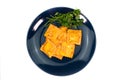 Blue plate with fish ravioli with parsley Royalty Free Stock Photo