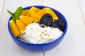 Blue plate with natural yogurt, orange. Diet menu. Royalty Free Stock Photo