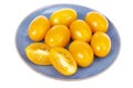 Blue plate with ripe yellow tomatoes. Photo Royalty Free Stock Photo
