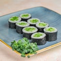 Blue Plate With Sushi on Table Royalty Free Stock Photo