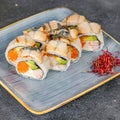 Blue Plate With Sushi and Vegetables Royalty Free Stock Photo