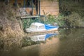 A blue and pleasure boat sunk on the Leeds Liverpool canal