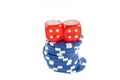 Blue poker chips and red dice cubes Royalty Free Stock Photo