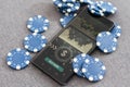 Blue poker chips on stock market chart background Royalty Free Stock Photo