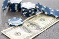 Blue poker chips on stock market chart background Royalty Free Stock Photo