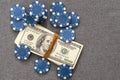 Blue poker chips on stock market chart background Royalty Free Stock Photo