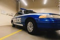 Blue police retro car with flashing lights on the roof Royalty Free Stock Photo