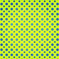 Blue polka dotted on chartreuse background Royalty Free Stock Photo