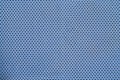 Blue Polyester breathable material texture with holes Closeup