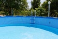 The blue pool is half filled with water Royalty Free Stock Photo