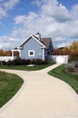 Blue Pool House with White Trim