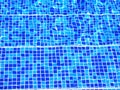Blue pool mosaic tile stairs Royalty Free Stock Photo