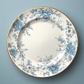 Blue porcelain plate with floral ornament on a gray background Royalty Free Stock Photo
