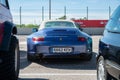 Blue Porsche 911 996 parked on street